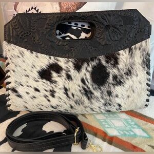 Elegant Black and White Cowhide Clutch